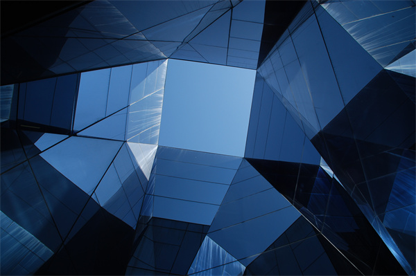 Glass exterior of a modern office building.